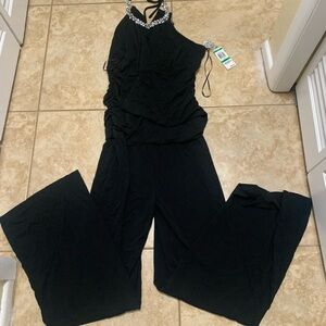 Elegant Black Jumpsuit tag price orig $99. Extra crystals incl